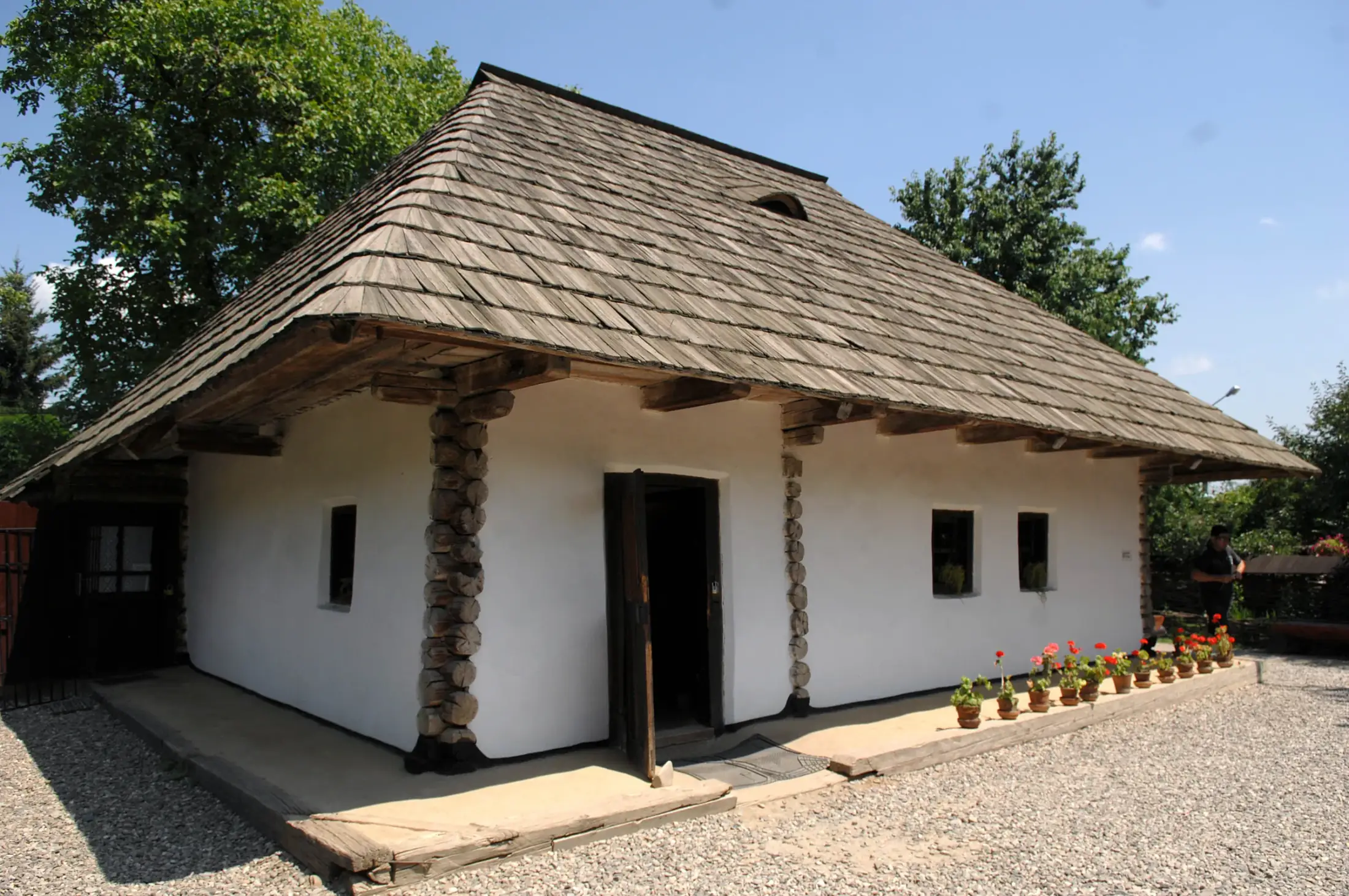 The Ion Creangă memorial house in Humulești, with its shingle roof and timber porch